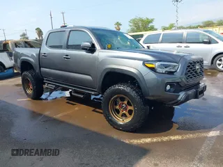 2021 Toyota Tacoma SR with VIN 3TMCZ5AN9MM421275, listed as a IAAI auction lot 41558510 with 32,150 mi miles and . Bid and sale history available at DreamBid. Image 1.