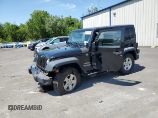 2014 Jeep Wrangler Sport with VIN 1C4AJWAG2EL113843, listed as a Copart auction lot 62771115 with 70,089 mi miles and Salvage title. Bid and sale history available at DreamBid. Image 1.