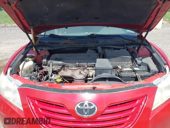 2007 Toyota Camry CE z VIN 4T1BE46K77U067512, wystawiony jako IAAI lot #42310634 z przebiegiem 153 322 mil mil oraz . Historia ofert i sprzedaży dostępna na DreamBid. Obrazek 10.