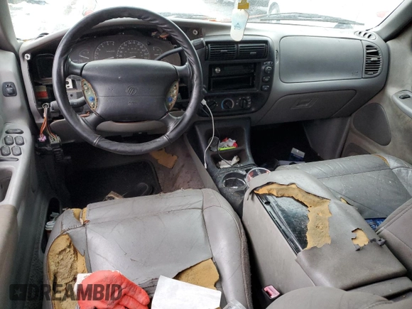 1999 Mercury Mountaineer with VIN 4M2ZU52E8XUJ22216, listed as a Copart auction lot 86806614 with 160,983 mi miles and Salvage title. Bid and sale history available at DreamBid. Image 8.