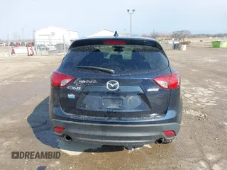 2015 Mazda CX-5 Touring with VIN JM3KE2CY0F0516589, listed as a IAAI auction lot 41707973 with 109,245 mi miles. Bid and sale history available at carsss.com. Image 16.