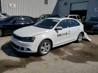 2013 Volkswagen Jetta TDI w/Premium с VIN 3VWLL7AJ1DM360107, выставлен на аукционе Copart как лот 55527235 с пробегом 164 470 миль миль и Списание • Salvage title. История ставок и продаж доступна на DreamBid. Изображение 1.