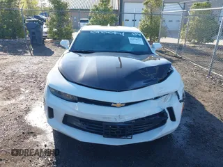 2017 Chevrolet Camaro 1LT with VIN 1G1FA1RX6H0136098, listed as a IAAI auction lot 41978704 with 136,637 mi miles and . Bid and sale history available at carsss.com. Image 12.