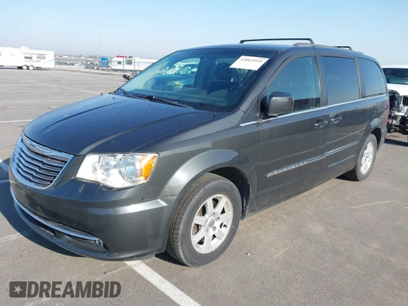 2011 Chrysler Town & Country Touring with VIN 2A4RR5DG6BR782499, listed as a IAAI auction lot 42063944 with 165,647 mi miles and . Bid and sale history available at DreamBid. Image 2.