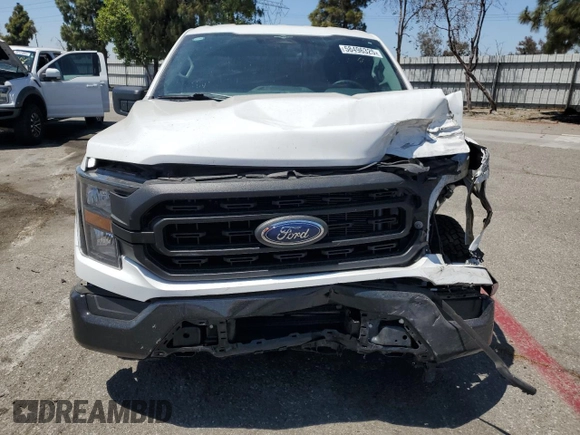 2023 Ford F-150 XL with VIN 1FTEX1CP5PKG20325, listed as a Copart auction lot 58496325 with 31,182 mi miles and Salvage title. Bid and sale history available at DreamBid. Image 5.
