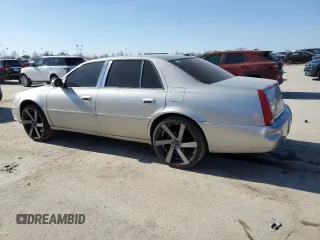 2007 Cadillac DTS V8 z VIN 1G6KD57Y87U140129, wystawiony jako Copart lot #48025875 z przebiegiem 184 526 mil mil oraz Szkody całkowita. Historia ofert i sprzedaży dostępna na DreamBid. Obrazek 2.