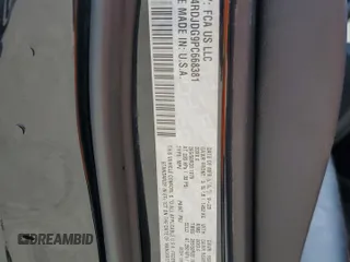 2023 Dodge Durango GT z VIN 1C4RDJDG9PC668381, wystawiony jako Copart lot #61684265 z przebiegiem Nie podano mil oraz Szkoda całkowita • Salvage title. Historia ofert i sprzedaży dostępna na DreamBid. Obrazek 13.