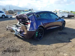 2020 Tesla Model 3 Standard Range Plus z VIN 5YJ3E1EA9LF599332, wystawiony jako IAAI lot #41563213 z przebiegiem Nie podano mil oraz . Historia ofert i sprzedaży dostępna na DreamBid. Obrazek 4.
