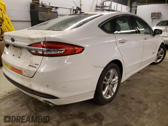 2018 Ford Fusion Hybrid SE with VIN 3FA6P0LU3JR163527, listed as a Copart auction lot 69866702 with 68,405 mi miles. Bid and sale history available at carsss.com. Image 3.
