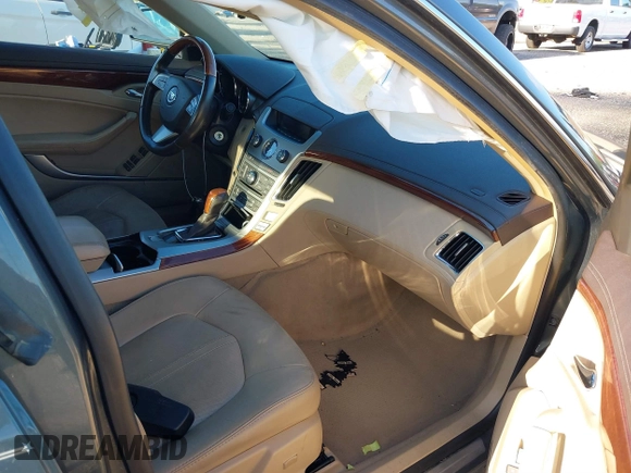 2011 Cadillac CTS Luxury with VIN 1G6DE5EY5B0154563, listed as a IAAI auction lot 36806985 with 92,635 mi miles and . Bid and sale history available at DreamBid. Image 5.