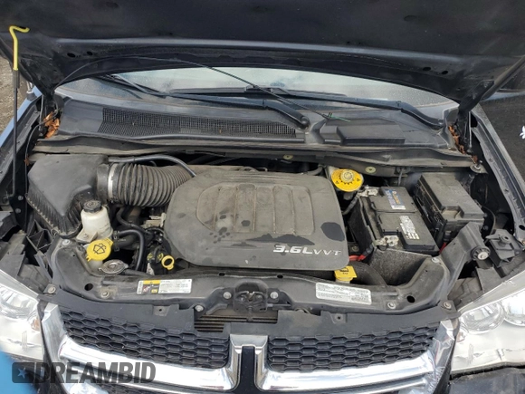 2018 Dodge Grand Caravan SXT with VIN 2C4RDGCG7JR307363, listed as a Copart auction lot 51110115 with 124,812 mi miles and Salvage Title. Bid and sale history available at DreamBid. Image 12.