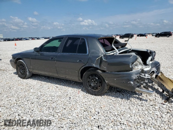 2007 Ford Police Interceptor with VIN 2FAFP71W27X152722, listed as a Copart auction lot 56252475 with 105,657 mi miles and Salvage title. Bid and sale history available at DreamBid. Image 2.