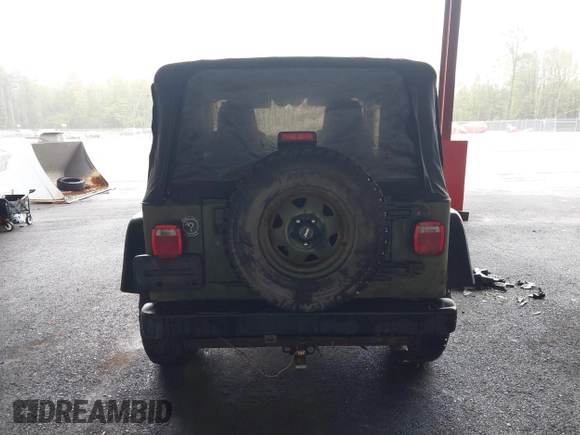 2005 Jeep Wrangler X z VIN 1J4FA39S75P310037, wystawiony jako IAAI lot #42186114 z przebiegiem 154 462 mil mil oraz . Historia ofert i sprzedaży dostępna na DreamBid. Obrazek 16.