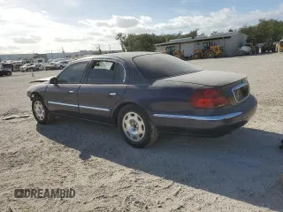 2001 Lincoln Continental with VIN 1LNHM97V21Y680964, listed as a Copart auction lot 80640714 with 0 mi miles and Salvage Title. Bid and sale history available at carsss.com. Image 2.