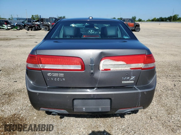 2012 Lincoln MKZ Hybrid z VIN 3LNDL2L33CR812788, wystawiony jako Copart lot #61068125 z przebiegiem 246 016 mil mil oraz Szkoda całkowita • Salvage title. Historia ofert i sprzedaży dostępna na DreamBid. Obrazek 6.