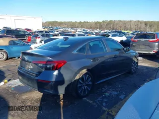 2024 Honda Civic Sedan EX with VIN 2HGFE1F77RH319511, listed as a IAAI auction lot 41424634 with 14,188 mi miles. Bid and sale history available at carsss.com. Image 4.