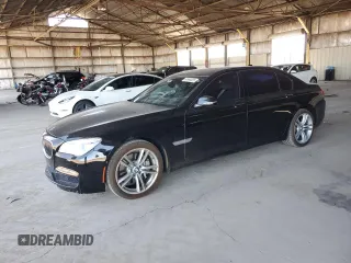2014 BMW 7 Series ALPINA B7 with VIN WBAYE8C54ED136428, listed as a Copart auction lot 61866855 with 126,118 mi miles and Salvage title. Bid and sale history available at DreamBid. Image 1.