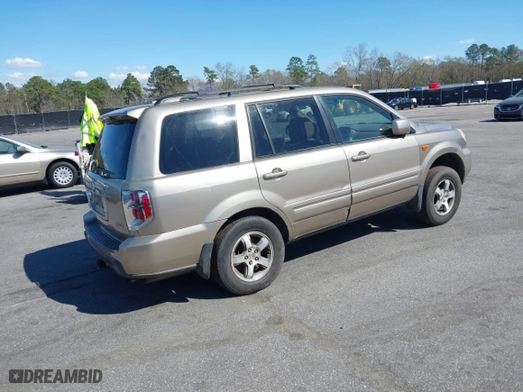 2006 Honda Pilot EX-L with VIN 5FNYF18516B020162, listed as a IAAI auction lot 41799229 with 304,627 mi miles. Bid and sale history available at carsss.com. Image 4.