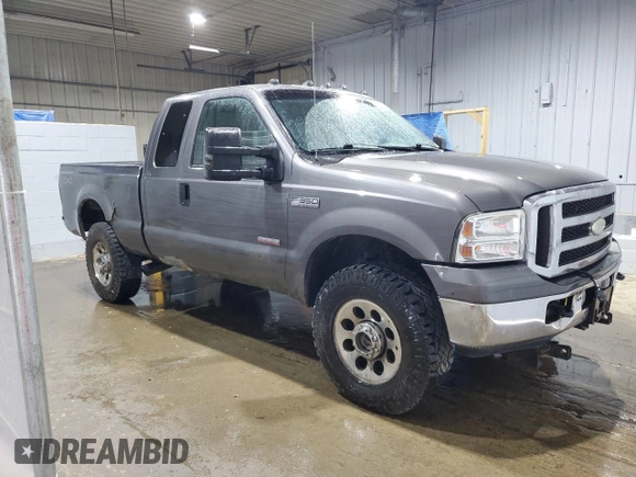 2005 Ford F-350 XL with VIN 1FTWX31P35EB41027, listed as a Copart auction lot 57124585 with 304,957 mi miles and Salvage title. Bid and sale history available at DreamBid. Image 4.