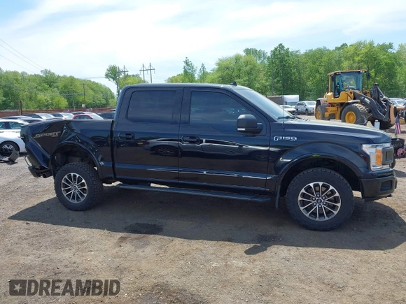 2018 Ford F-150 XL with VIN 1FTEW1EG0JFB61382, listed as a IAAI auction lot 42231412 with 101,376 mi miles and . Bid and sale history available at DreamBid. Image 13.