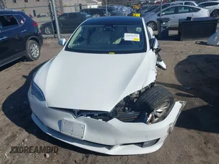 2017 Tesla Model S 100D with VIN 5YJSA1E22HF219352, listed as a IAAI auction lot 41831322 with 97,516 mi miles and . Bid and sale history available at DreamBid. Image 12.
