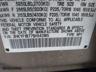 2005 Honda Pilot EX-L with NAVI with VIN 2HKYF18775H543185, listed as a IAAI auction lot 41597576 with 163,377 mi miles. Bid and sale history available at carsss.com. Image 9.