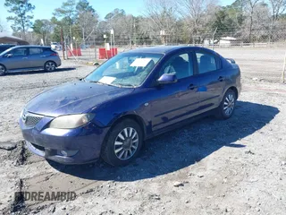 2006 Mazda 3 i Touring with VIN JM1BK32F561494865, listed as a IAAI auction lot 41637307 with 157,317 mi miles and . Bid and sale history available at DreamBid. Image 2.