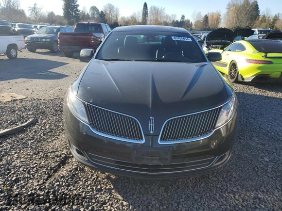 2014 Lincoln MKS EcoBoost with VIN 1LNHL9FT2EG600500, listed as a Copart auction lot 83764694 with 74,949 mi miles and Salvage title. Bid and sale history available at DreamBid. Image 5.