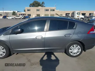 2010 Honda Insight LX with VIN JHMZE2H50AS019740, listed as a IAAI auction lot 41665527 with 74,022 mi miles and . Bid and sale history available at DreamBid. Image 14.