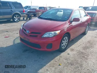 2013 Toyota Corolla L with VIN 5YFBU4EE4DP171631, listed as a IAAI auction lot 42185923 with 87,892 mi miles and . Bid and sale history available at DreamBid. Image 2.