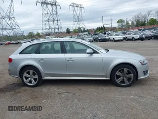 2013 Audi allroad Premium Plus with VIN WA1UFAFL0DA105820, listed as a IAAI auction lot 42095816 with 213,368 mi miles. Bid and sale history available at carsss.com. Image 14.