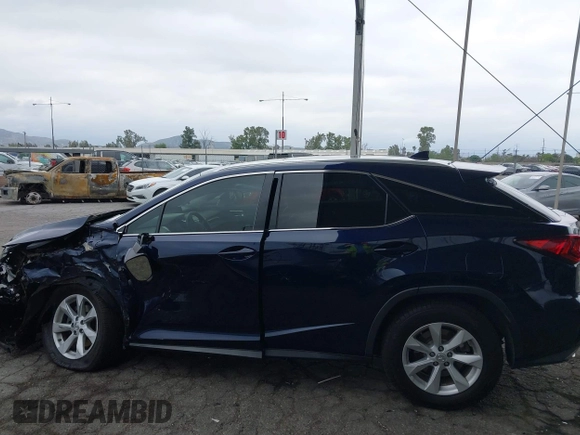 2016 Lexus RX 350 z VIN 2T2BZMCA6GC052982, wystawiony jako IAAI lot #42185246 z przebiegiem 125 518 mil mil oraz . Historia ofert i sprzedaży dostępna na DreamBid. Obrazek 14.