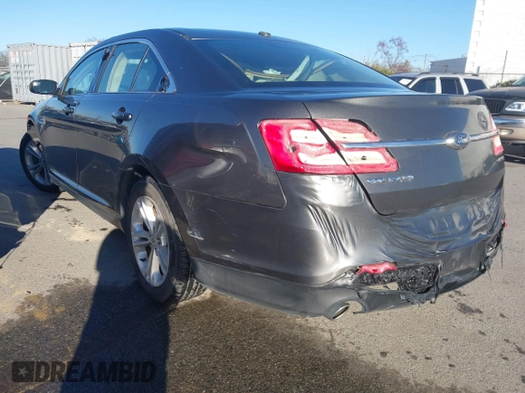2015 Ford Taurus SE with VIN 1FAHP2D89FG134151, listed as a IAAI auction lot 41750681 with 102,348 mi miles and . Bid and sale history available at carsss.com. Image 3.