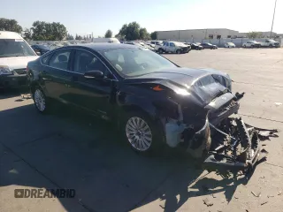 2013 Ford Fusion SE Hybrid with VIN 3FA6P0LU7DR363136, listed as a Copart auction lot 64764315 with 173,575 mi miles and Salvage title. Bid and sale history available at DreamBid. Image 4.