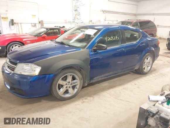 2013 Dodge Avenger SE with VIN 1C3CDZAB6DN599070, listed as a IAAI auction lot 42025692 with 245,920 mi miles and . Bid and sale history available at carsss.com. Image 2.
