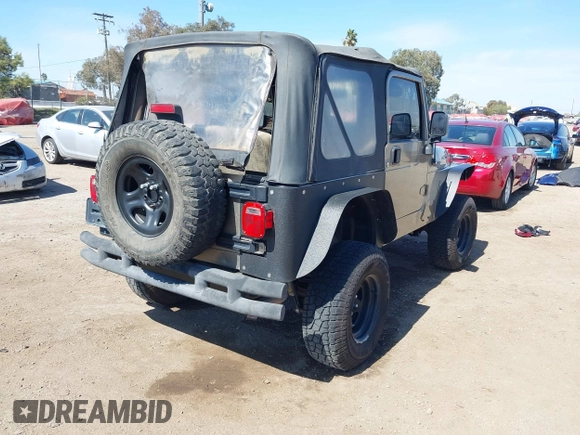 2005 Jeep Wrangler Sport with VIN 1J4FA49S65P342497, listed as a IAAI auction lot 41674606 with 123,457 mi miles. Bid and sale history available at carsss.com. Image 4.