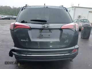 2018 Toyota RAV4 LE with VIN 2T3BFREV8JW850391, listed as a IAAI auction lot 42487413 with 66,866 mi miles and . Bid and sale history available at DreamBid. Image 16.