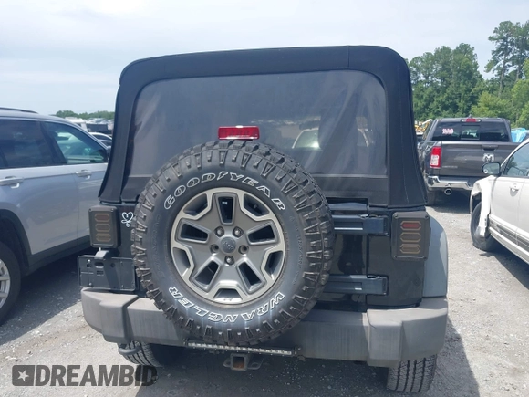 2012 Jeep Wrangler Unlimited Sport with VIN 1C4BJWDG0CL233718, listed as a IAAI auction lot 42551935 with 227,693 mi miles and . Bid and sale history available at DreamBid. Image 16.