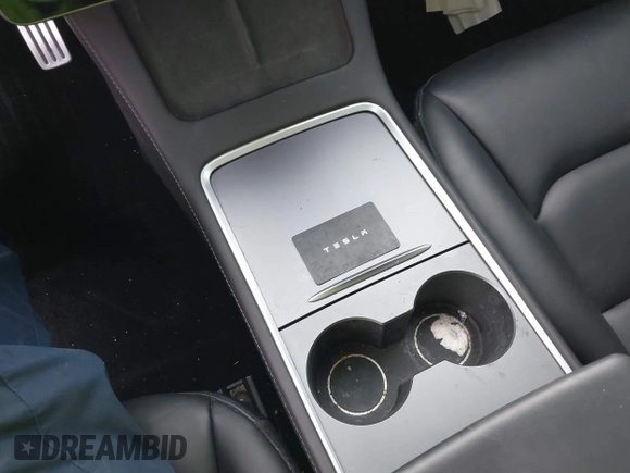 2023 Tesla Model 3 Performance z VIN 5YJ3E1EC3PF716085, wystawiony jako IAAI lot #41911684 z przebiegiem 45 184 mil mil oraz . Historia ofert i sprzedaży dostępna na DreamBid. Obrazek 11.