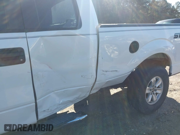 2014 Ford F-150 XL with VIN 1FTFX1EF1EFB73703, listed as a IAAI auction lot 41576855 with 122,721 mi miles. Bid and sale history available at carsss.com. Image 6.