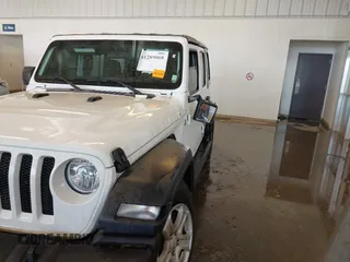 2019 Jeep Wrangler Unlimited Sport S with VIN 1C4HJXDG1KW577779, listed as a IAAI auction lot 41289068 with 126,011 mi miles and . Bid and sale history available at DreamBid. Image 11.