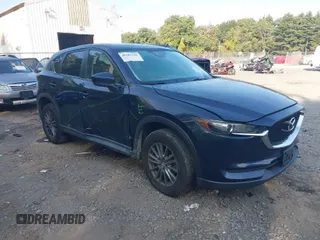 2017 Mazda CX-5 Touring with VIN JM3KFBCL6H0170455, listed as a IAAI auction lot 40381242 with 71,520 mi miles. Bid and sale history available at carsss.com. Image 1.