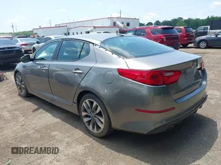 2014 Kia Optima SX with VIN 5XXGR4A75EG270693, listed as a IAAI auction lot 42606134 with 126,486 mi miles and . Bid and sale history available at DreamBid. Image 3.