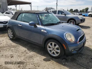2010 MINI Convertible S with VIN WMWMS3C5XATY51076, listed as a Copart auction lot 48532735 with 104,901 mi miles and Clean title. Bid and sale history available at DreamBid. Image 4.