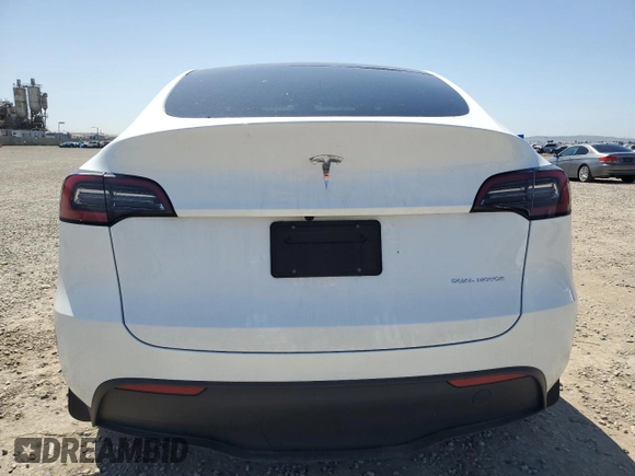 2023 Tesla Model Y Long Range z VIN 7SAYGDEE2PA061792, wystawiony jako Copart lot #52106965 z przebiegiem 11 968 mil mil oraz Szkoda całkowita • Salvage title. Historia ofert i sprzedaży dostępna na DreamBid. Obrazek 6.