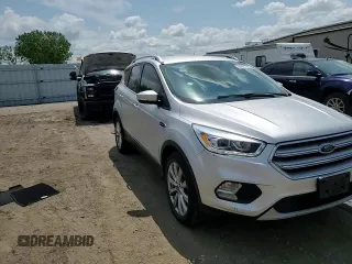 2018 Ford Escape Titanium with VIN 1FMCU9J99JUC89677, listed as a Copart auction lot 60421545 with 98,021 mi miles and Salvage title. Bid and sale history available at DreamBid. Image 14.