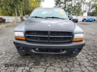2003 Dodge Dakota Sport with VIN 1D7HL38N63S192308, listed as a Copart auction lot 77494684 with 128,512 mi miles and Salvage Title. Bid and sale history available at carsss.com. Image 5.