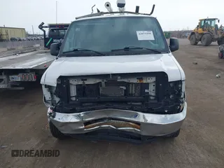 2013 Ford Econoline Cargo Commercial with VIN 1FTNE2EW9DDA82065, listed as a IAAI auction lot 42073299 with 259,758 mi miles and . Bid and sale history available at DreamBid. Image 12.