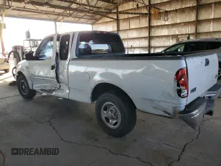 2000 Ford F-150 XL with VIN 1FTRX17W1YNB88948, listed as a Copart auction lot 83114404 with 288,100 mi miles and Salvage Title. Bid and sale history available at carsss.com. Image 2.