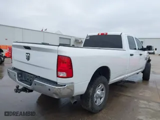 2018 Ram 2500 Tradesman with VIN 3C6UR5HL5JG399270, listed as a IAAI auction lot 41134177 with 128,713 mi miles. Bid and sale history available at carsss.com. Image 4.